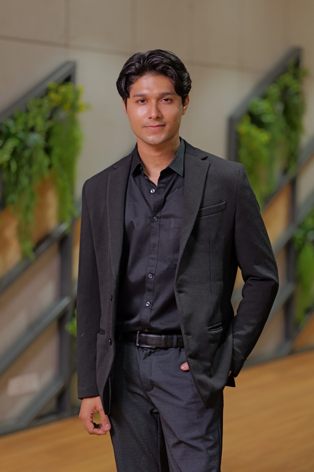 Samrth Kanungo in a black blazer and shirt